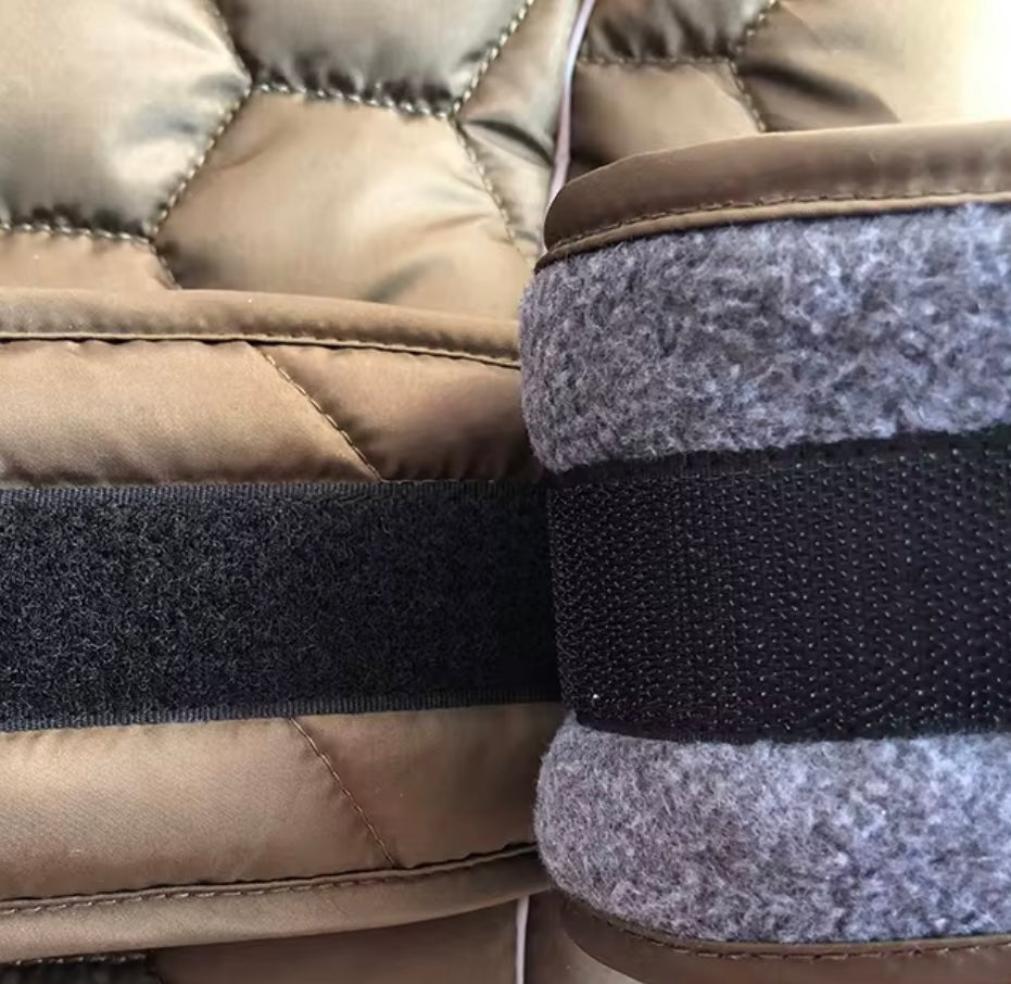 Close-up of fleece lining and adjustable velcro closure on The Heritage Field Coat for dogs